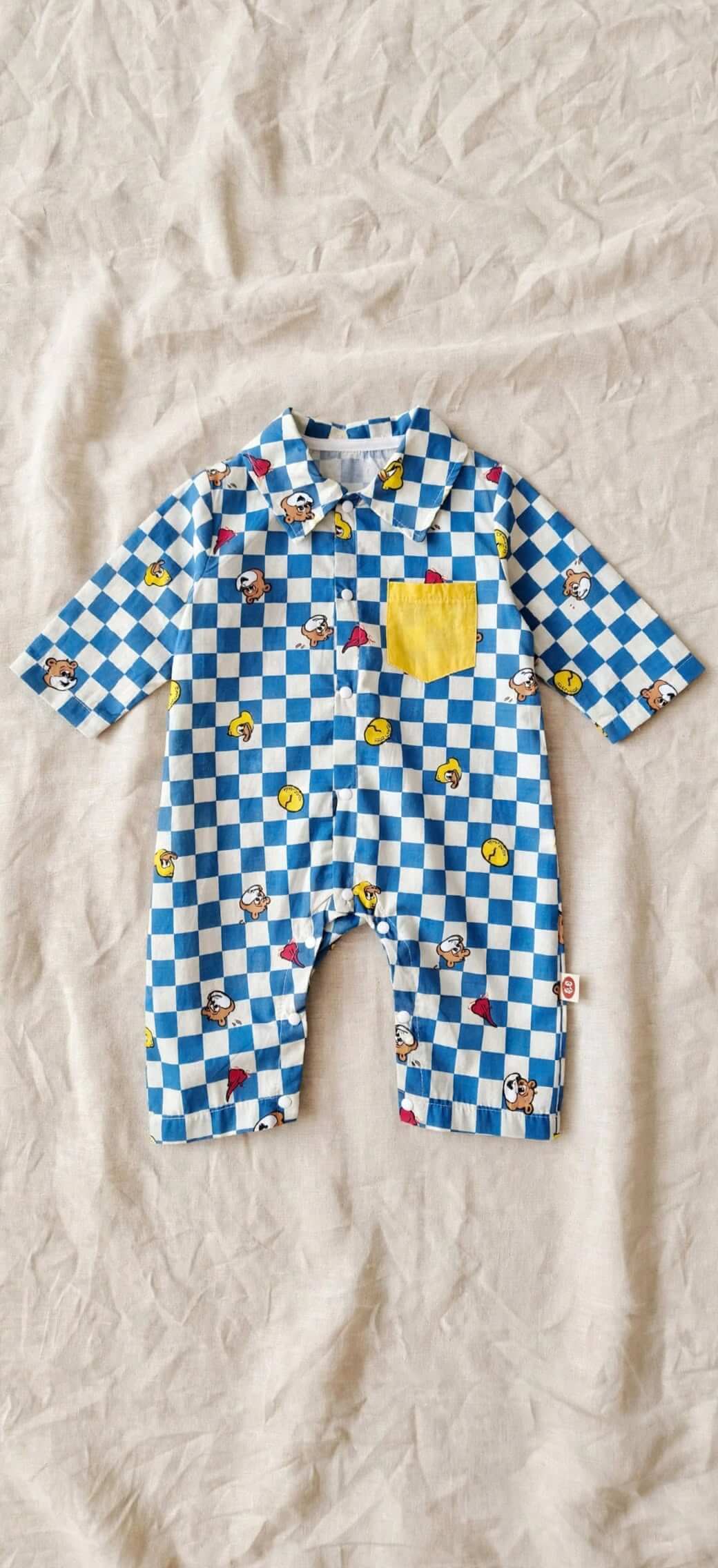 Combinaison Bébé à Damier Bleu - Poche Jaune