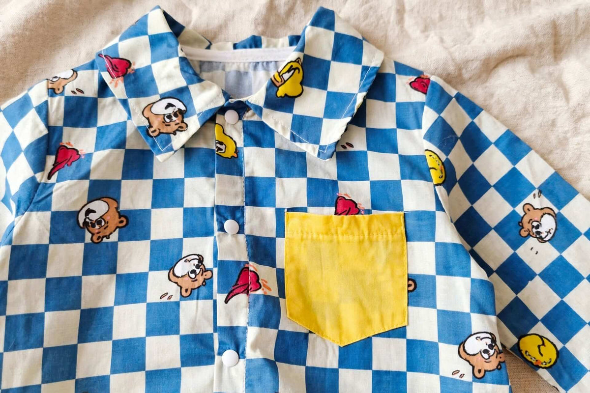 Combinaison Bébé à Damier Bleu - Poche Jaune