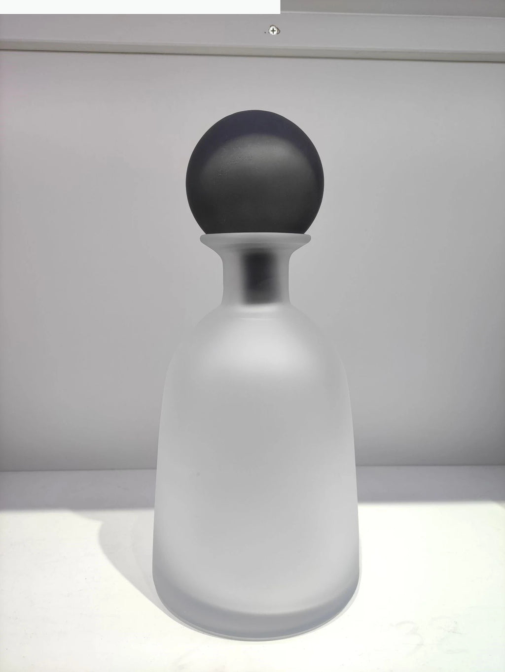 Vase en verre dépoli transparent